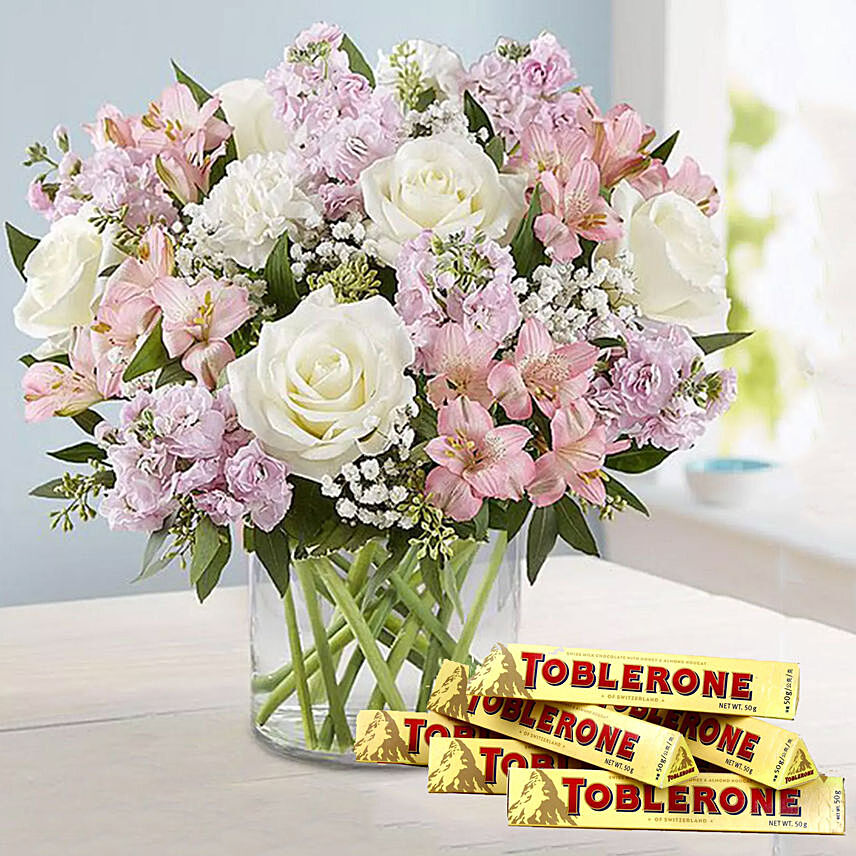 Pink N White Flowers in Vase and Toblerone Chocolates