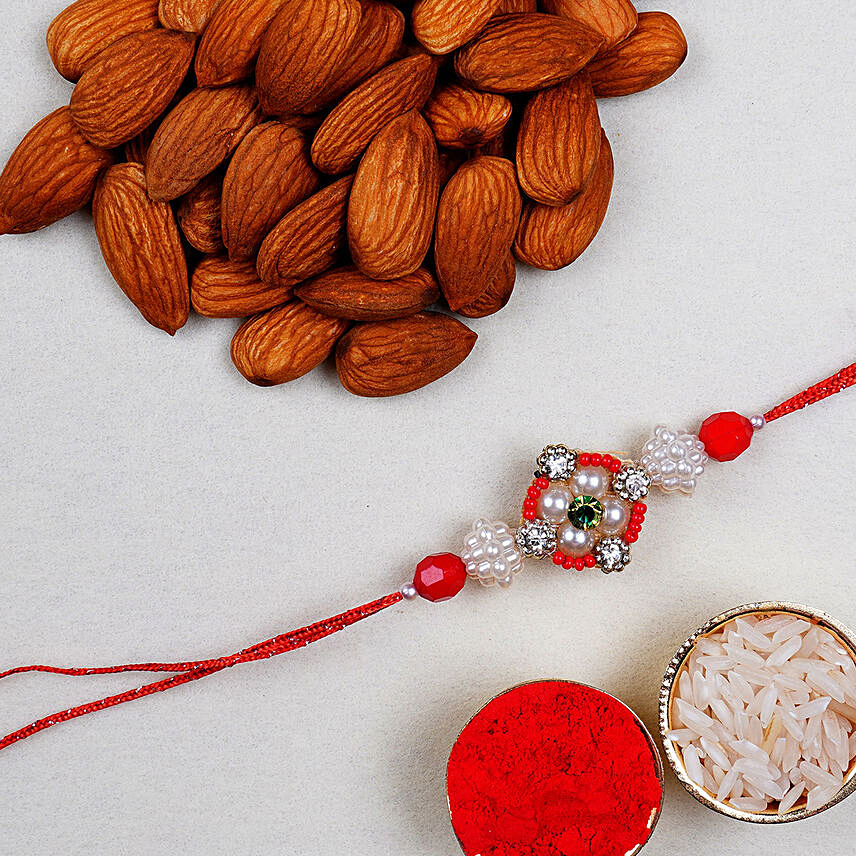 Appealing Floral Rakhi And Almonds