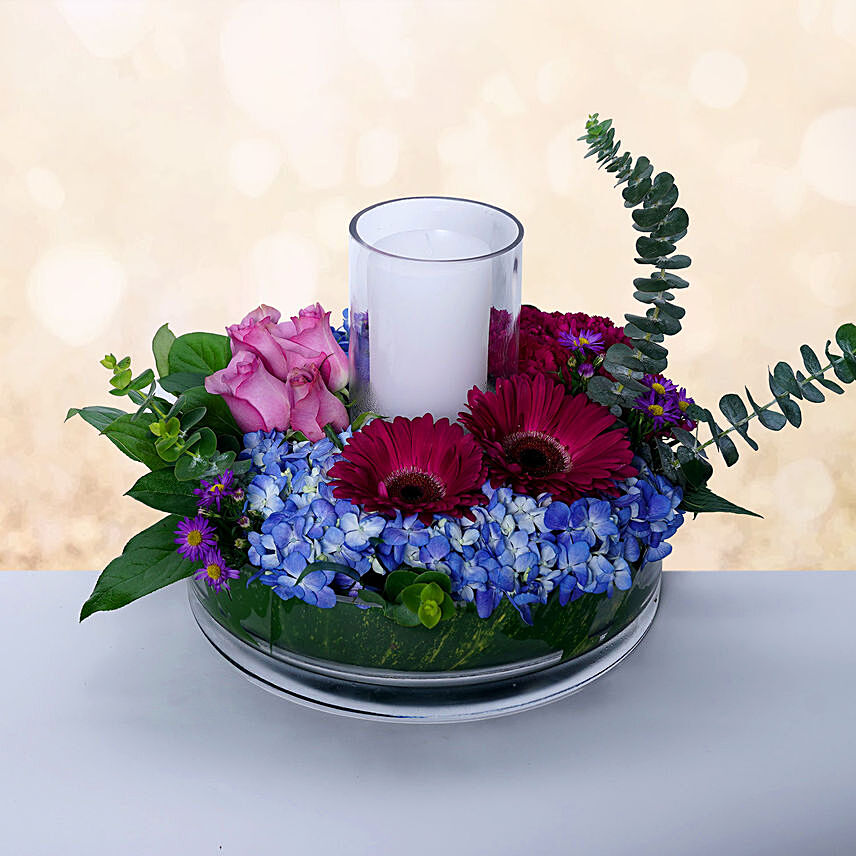 Exquisite Mixed Flowers And Candle Arrangement