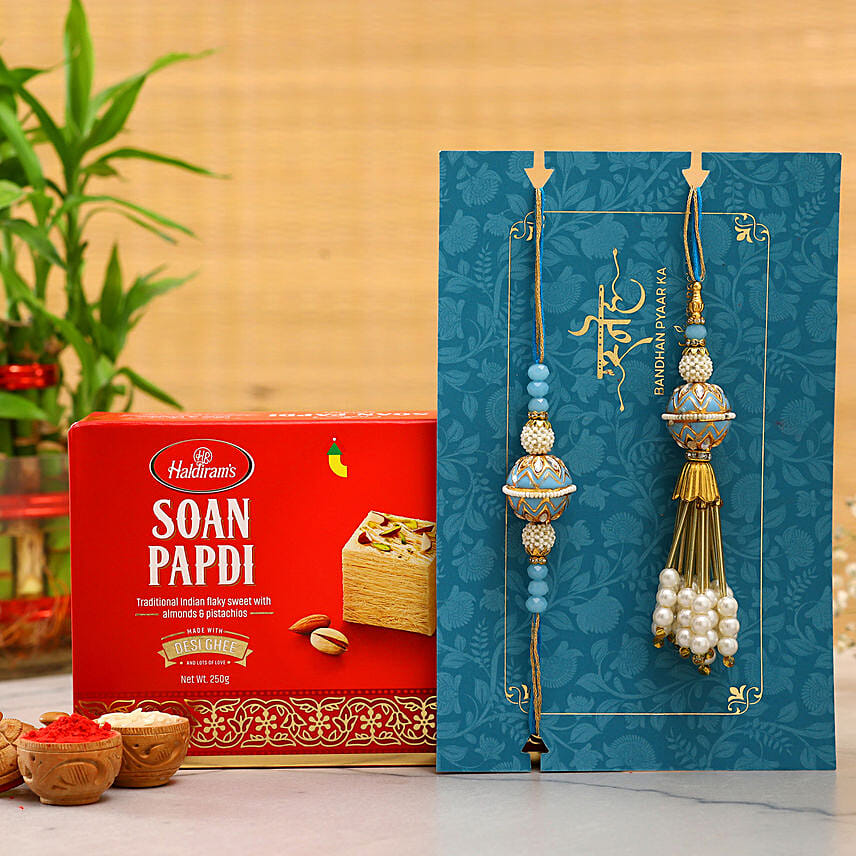 Blue Orb Pearl And Lumba Rakhi Set With Soan Papdi