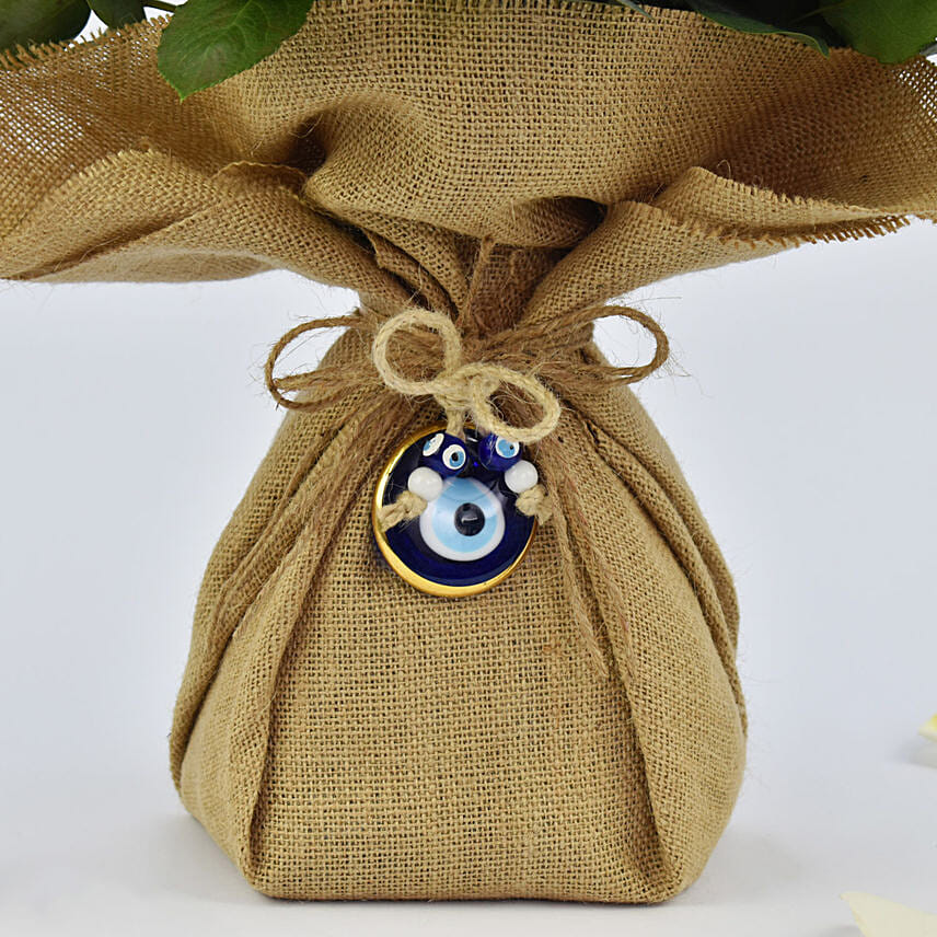 Online White Roses Bouquet with Evil eye Gift Delivery in UAE FNP