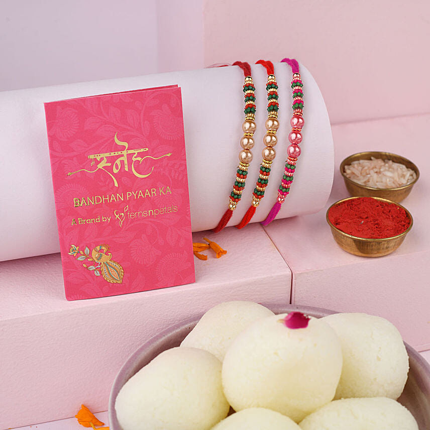 Sneh Gleaming Pearls Rakhi Set & Rasgulla