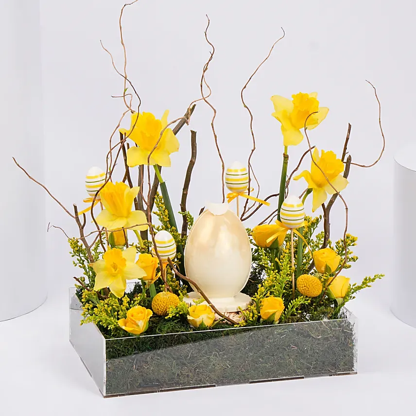 Easter Egg Chocolate And Daffodils