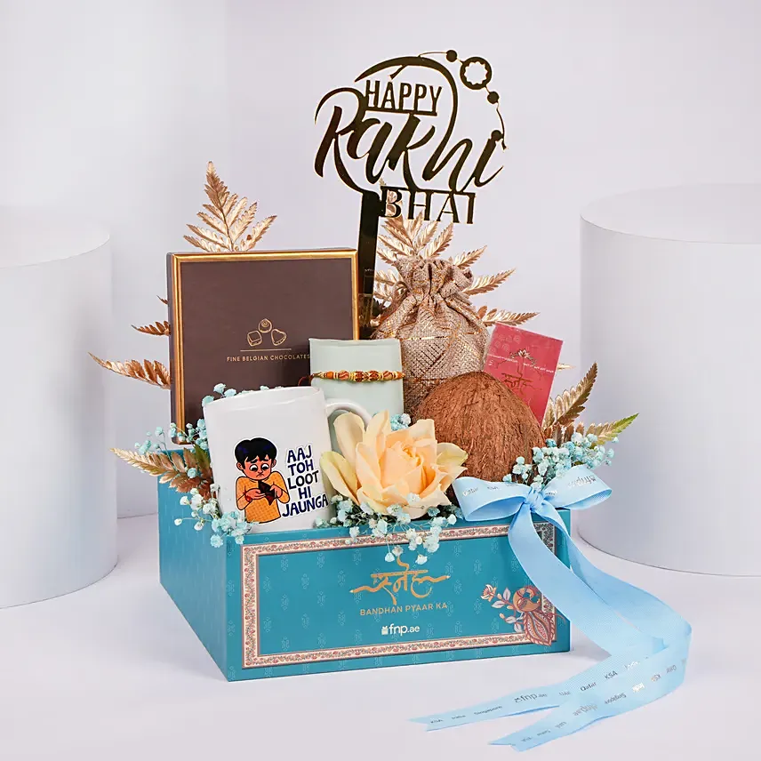 Divine Rudraksh Rakhi In Gift Box With Chocolates And Floral Arrangement