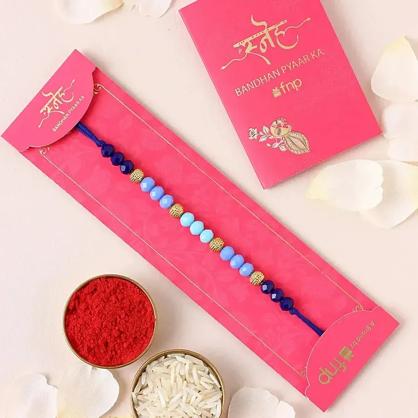 Tranquil Harmony Beads Rakhi And 24 Pcs Ferrero Rocher: Rakhi In Dubai
