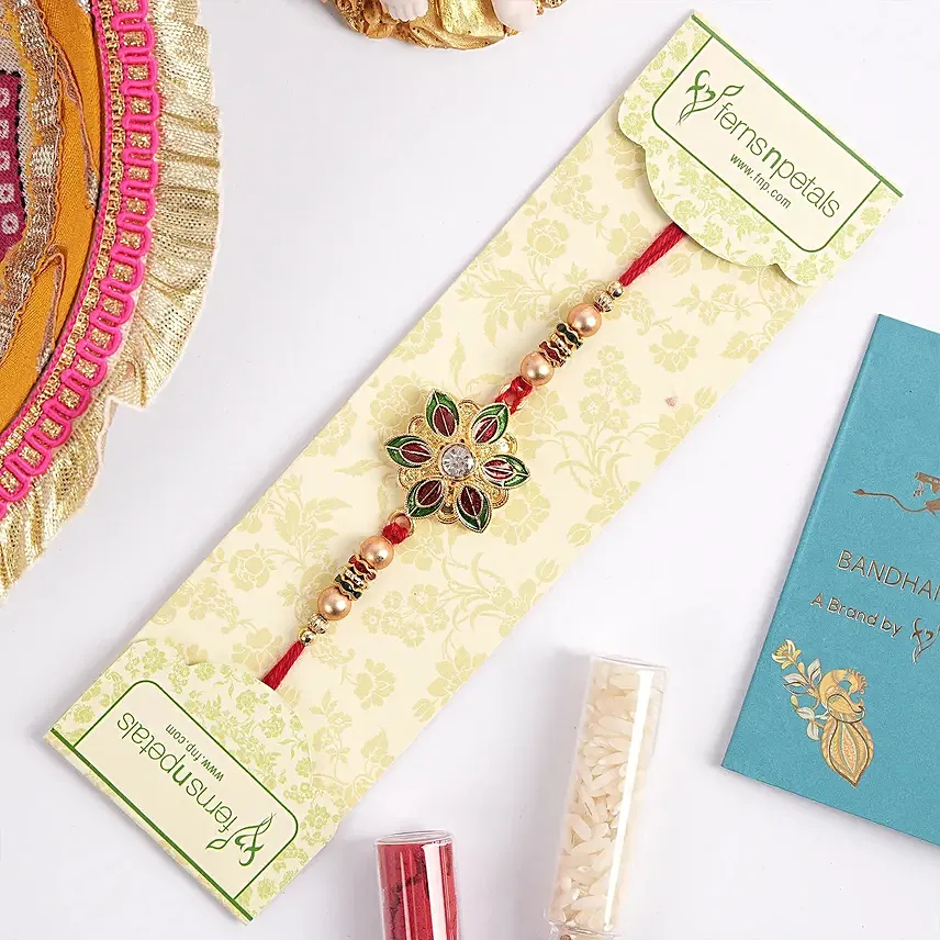 Green N Red Flower Shape Rakhi And 24 Pcs Ferrero Rocher: Rakhi to Al Ain