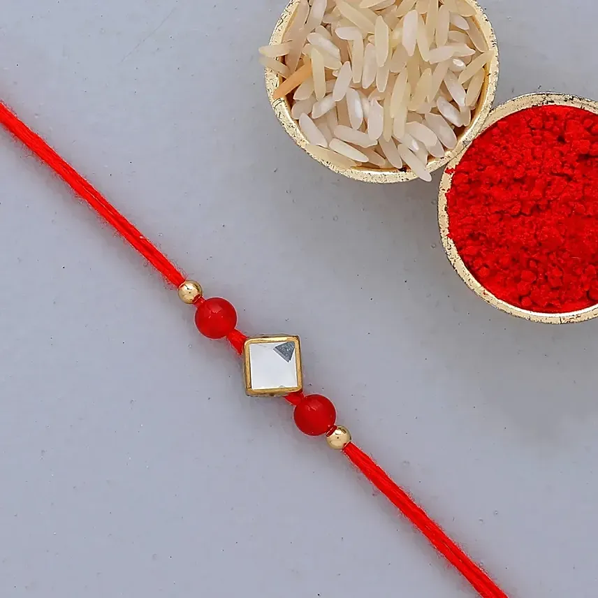 Red Thread Square Design Rakhi And 24 Pcs Ferrero Rocher: Rakhi In Dubai