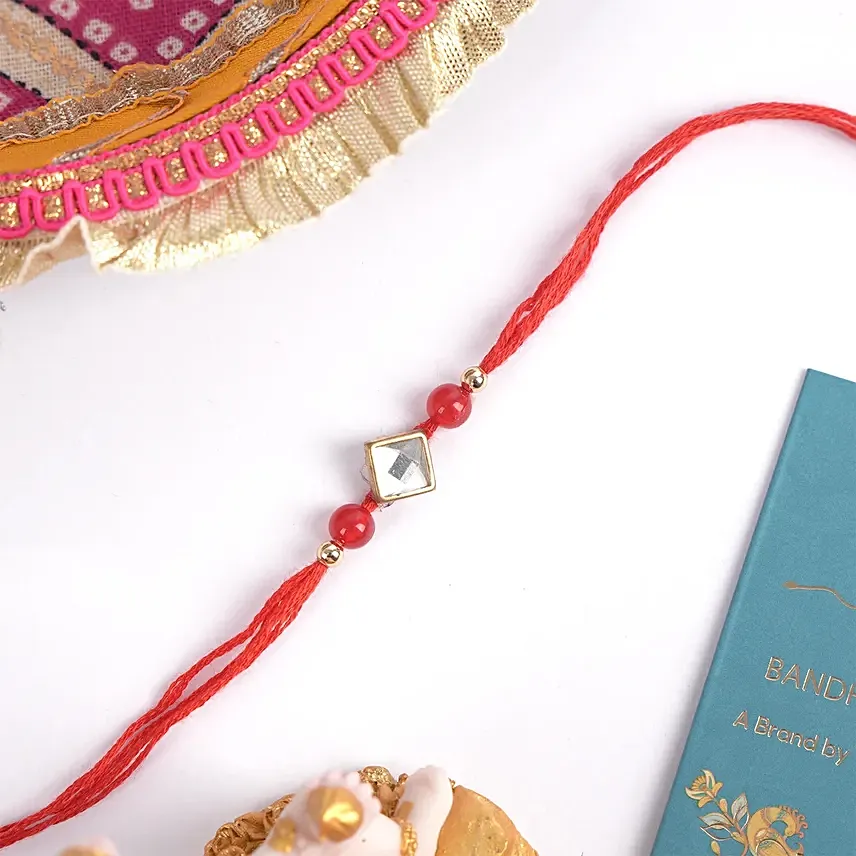 Red Thread Square Design Rakhi: 