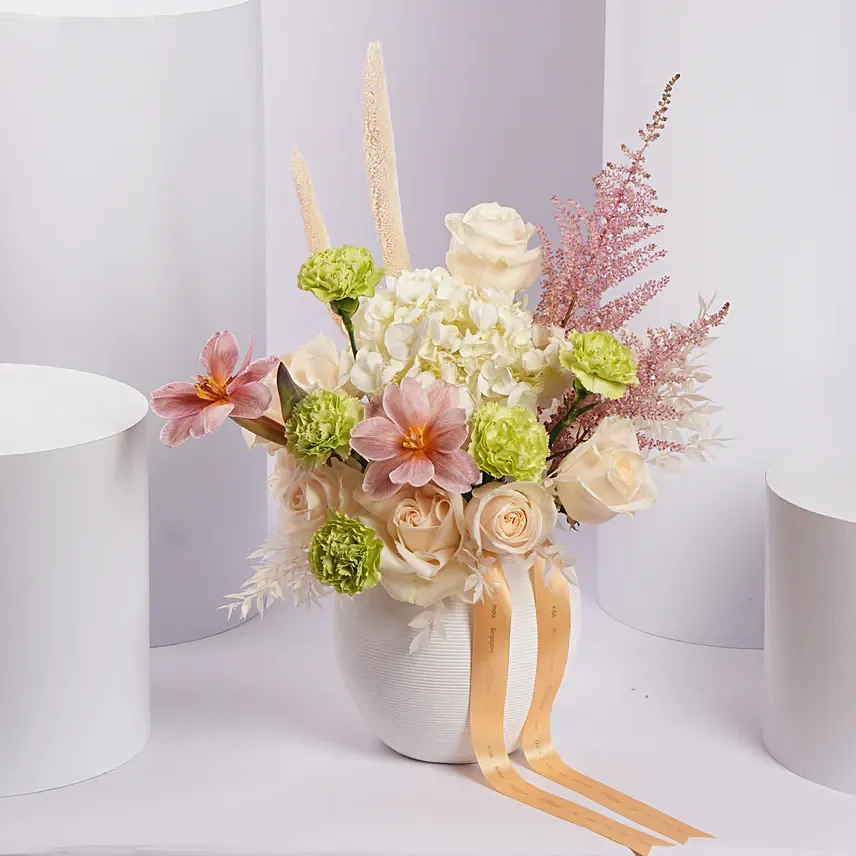 Charming Mixed Flower Arrangement in White Vase Charming Mixed Flower Arrangement in White Vase: Premium Flowers