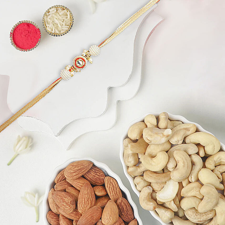 Crimson Majestic Pearl Rakhi With Almonds and Cashew Crimson Majestic Pearl Rakhi With Almonds and Cashew: Rakhi With Dryfruits
