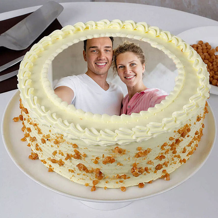 1 Kg Butterscotch Cake with Red Roses Bouquet
