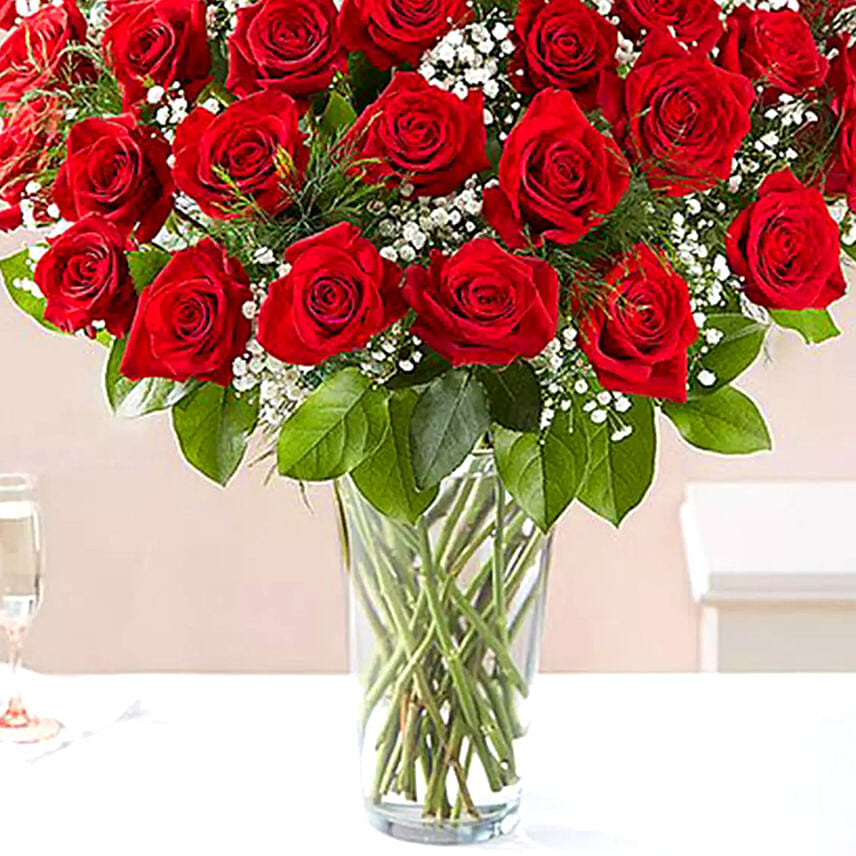 1 Kg Chocolaty Red Velvet Cake With 50 Roses Arrangement