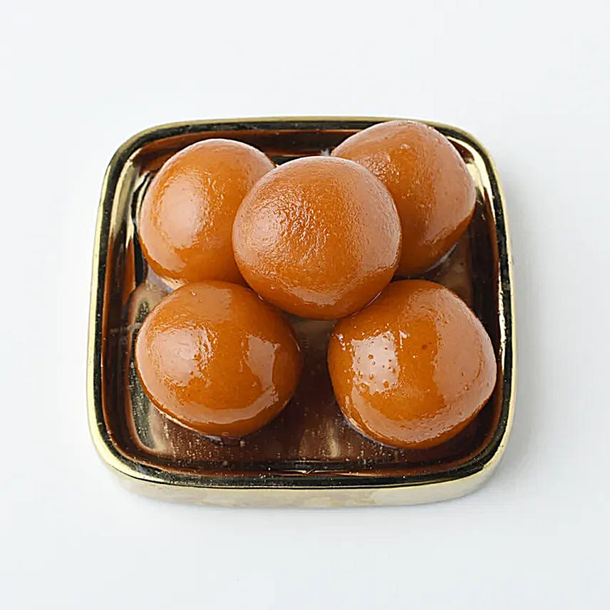 Appealing Floral Rakhi Set With Gulab Jamun And Dry Fruits