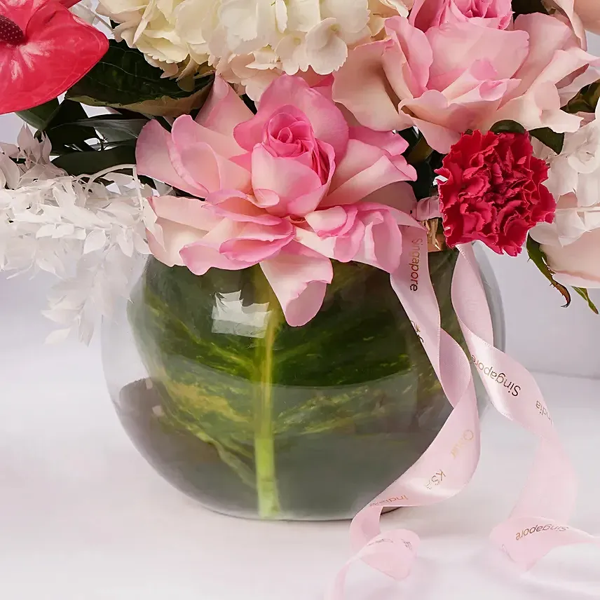 Blushing Blossom Arrangement in Glass Vase