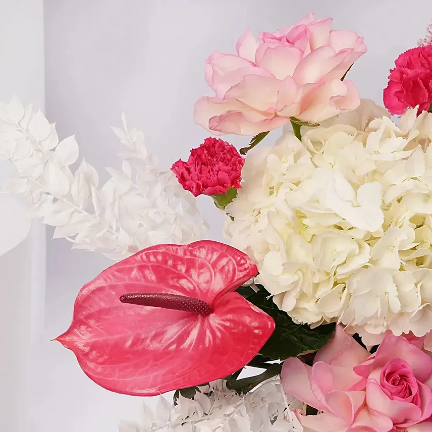 Blushing Blossom Arrangement in Glass Vase