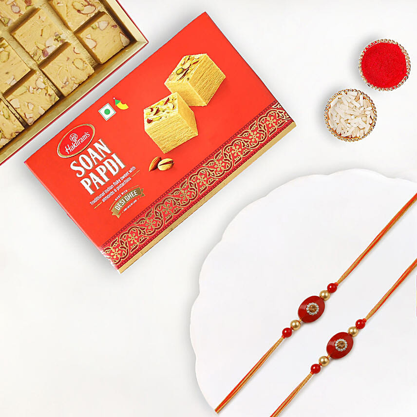 Festive Beads Rakhi Set Of 2 With Soan Papdi