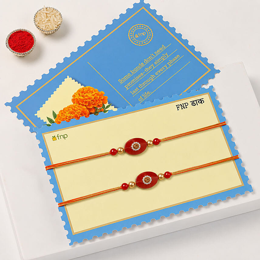 Festive Beads Rakhi Set Of 2 With Soan Papdi