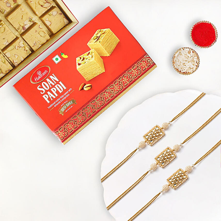 Kundan Pearl Rakhi Set Of 3 With Soan Papdi