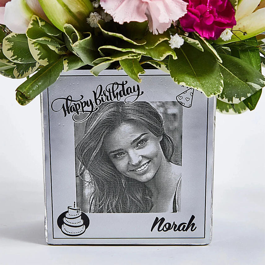 Personalised vase with flower arrangement