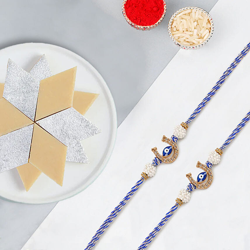 Protective Evil Eye Rakhi Duo With Kaju Katli