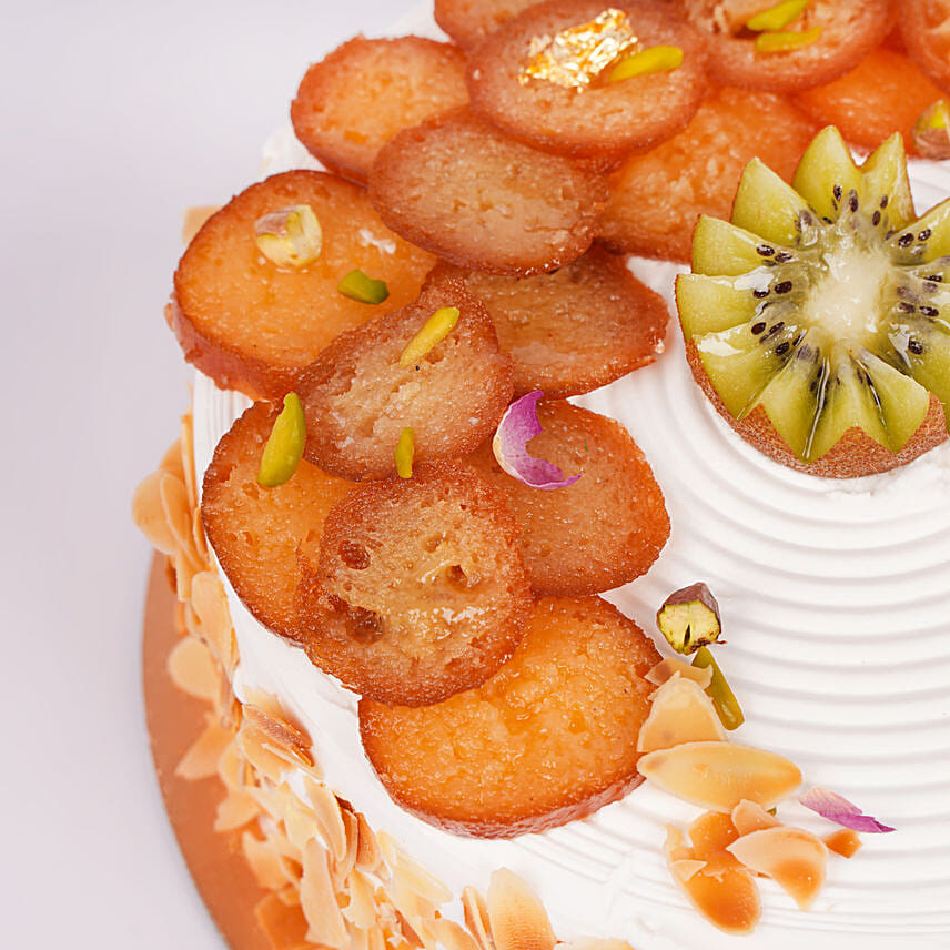 Rakhi Special Half Kg Vanilla Cake Topped With Gulab Jamun And Kiwi