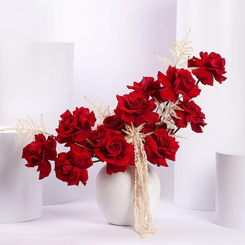 Red Rose Flower Arrangement in White Ceramic Vase