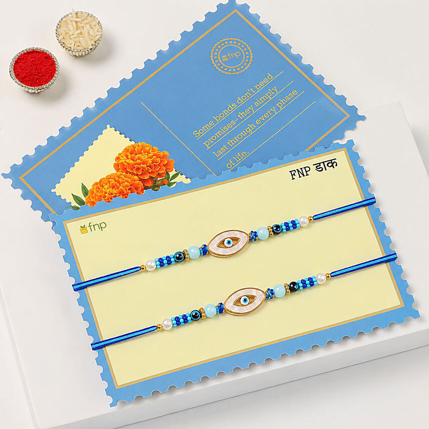 Signature Evil Eye Rakhi Pair With Ferrero Rocher 16 Pcs