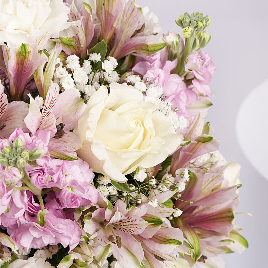 White and Pink Floral Bunch In Glass Vase