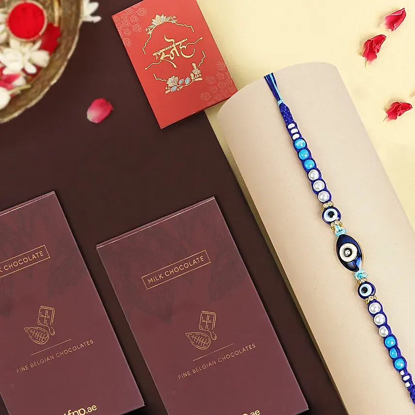 Galactic Blue Protector Evil Eye Rakhi N Milk Chocolates Galactic Blue Protector Evil Eye Rakhi N Milk Chocolates: Designer Fancy Rakhi