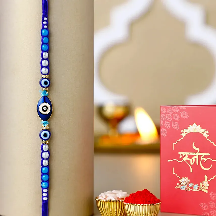 Galactic Blue Protector Evil Eye Rakhi Galactic Blue Protector Evil Eye Rakhi: Fancy Rakhi
