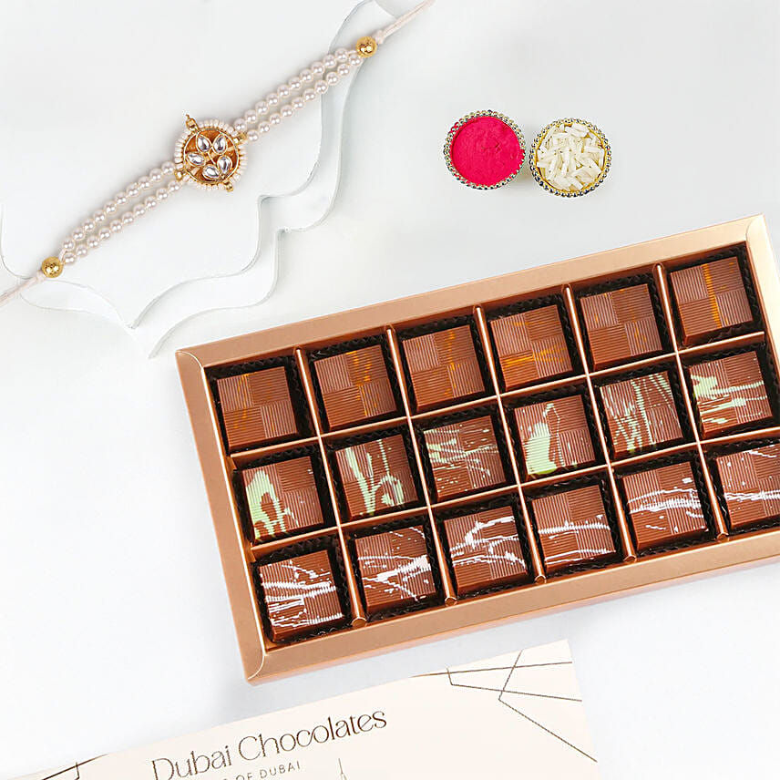 Pearl Kundan Designer Rakhi And Dubai Chocolates Pearl Kundan Designer Rakhi And Dubai Chocolates: Kundan Rakhi