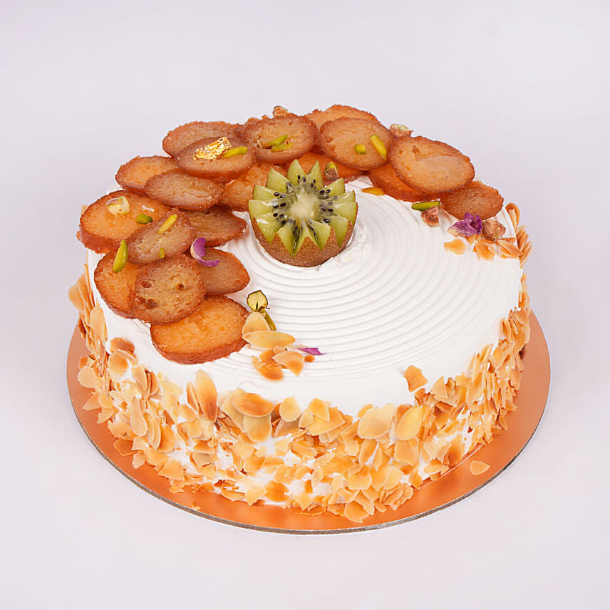 Rakhi Special Vanilla Cake Topped With Gulab Jamun And Kiwi Rakhi Special Vanilla Cake Topped With Gulab Jamun And Kiwi: Ganesh Chaturthi Gifts