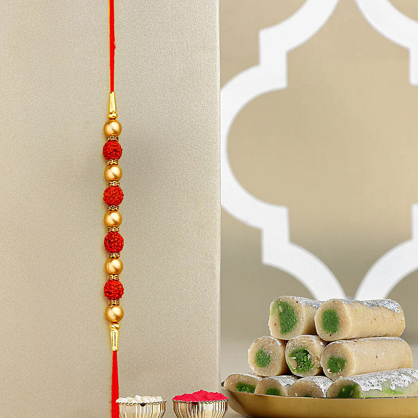 The Sacred Rudraksha Rakhi With Kaju Roll: Rudraksha Rakhi 