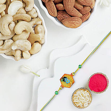 Enchanting Love in 3D Krishna Rakhi With Almonds and Cashew: Rakhi With Dryfruits