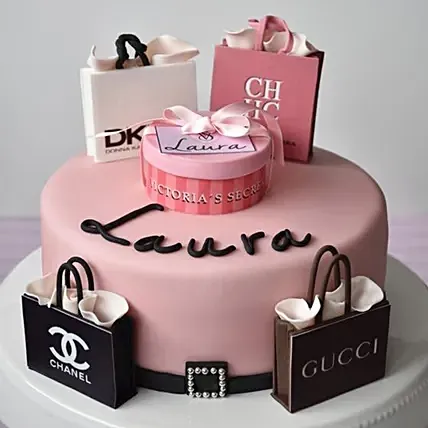 كيكة فيكتوريا سيكريت الأنثوية الوردية مزينة بحقائب تسوق: كيكات فانيلا