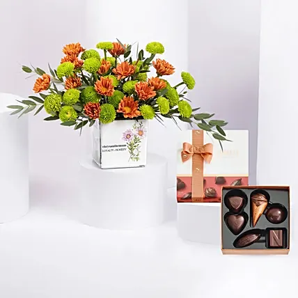 مزهرية أقحوان عيد الميلاد مع بوكس شوكولاتة: زهور الأقحوان أون لاين