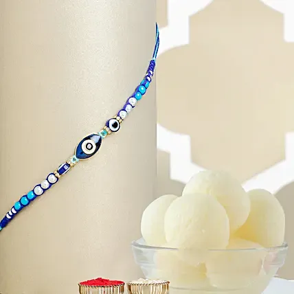 Galactic Blue Protector Evil Eye Rakhi with Rasgulla Tin: Rakhi for Kids 