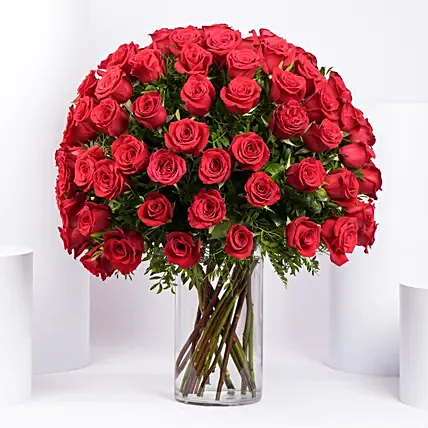 Ravishing 100 Red Roses In Glass Vase: Gifts Delivery Dubai