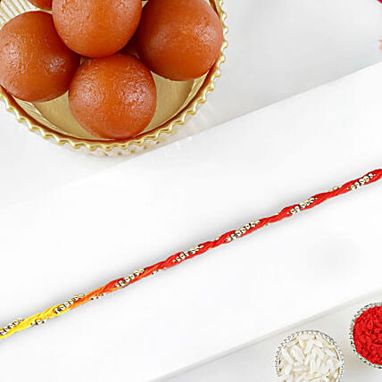 Sacred Bead Work Mauli Rakhi With Gulab Jamun: Rakhi with Sweets