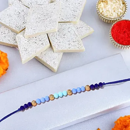 Tranquil Harmony Beads Rakhiand Kaju Katli: Rakhi with Sweets