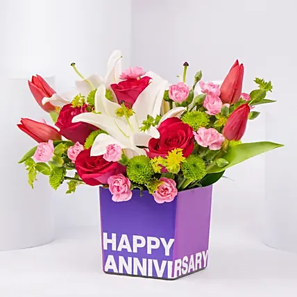 Tulips Roses and Carnations in Glass Vase: Wedding Anniversary Gift For Wife