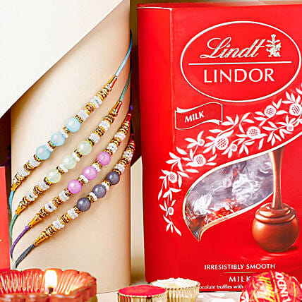 Zen Beadwork Rakhi N Chocolate Bombs Combo: Pearl Rakhi