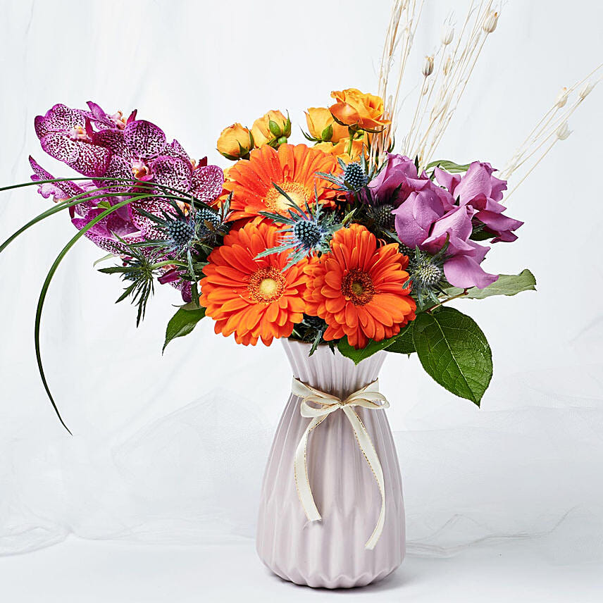 Blissful Mixed Flowers Purple Vase Arrangement