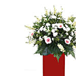 Lovely Mixed Flowers Red Stand Arrangement