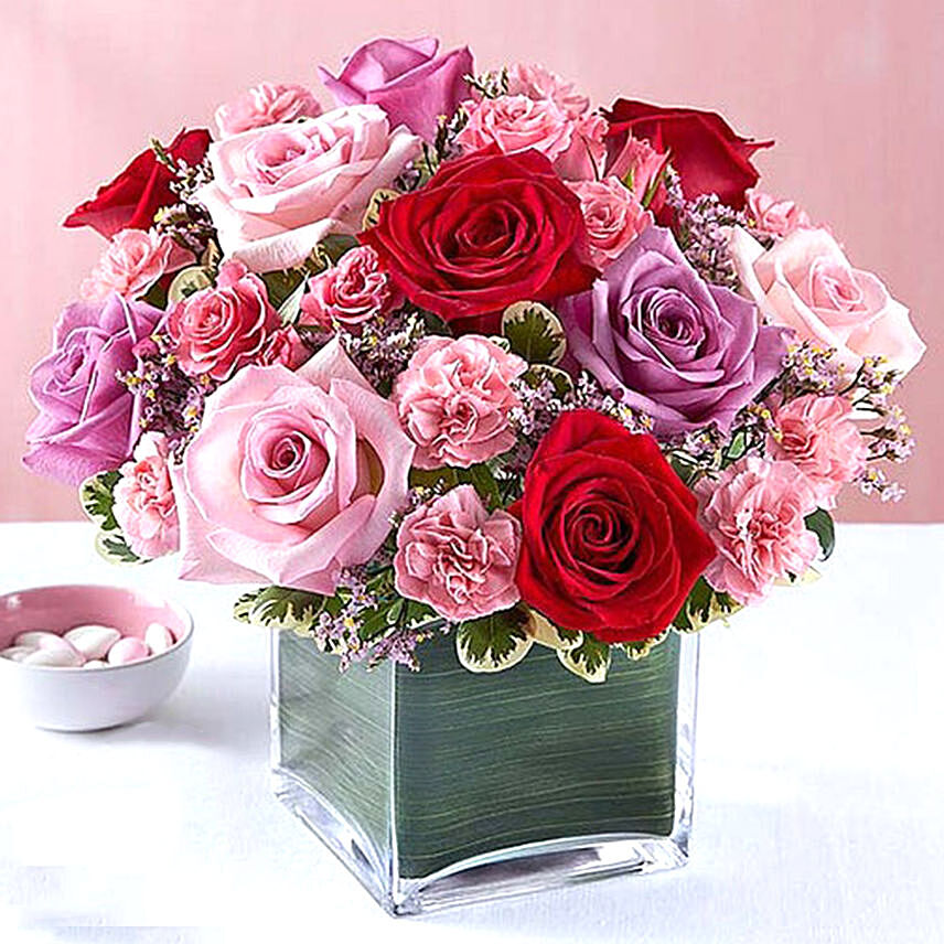 Bright Color Roses In Glass Vase