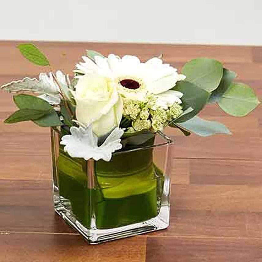 Glass Vase Of White Flowers