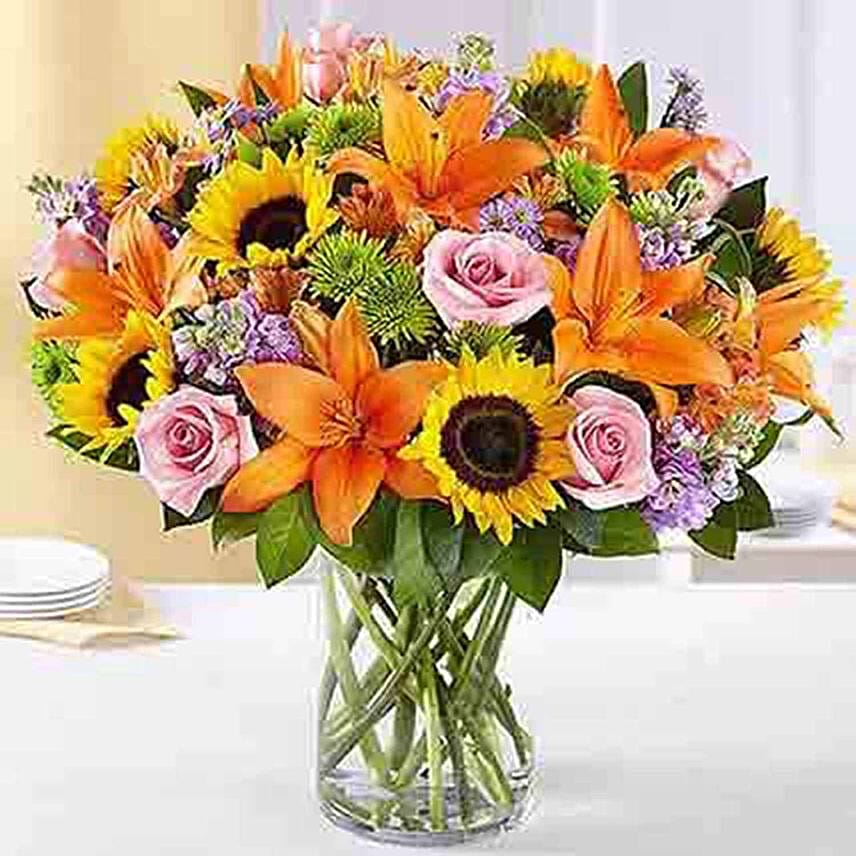 Vibrant Bunch of Mix Flowers In Glass Vase