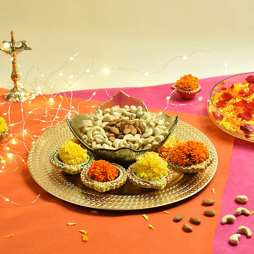 Dry Fruits And Diyas In A Platter