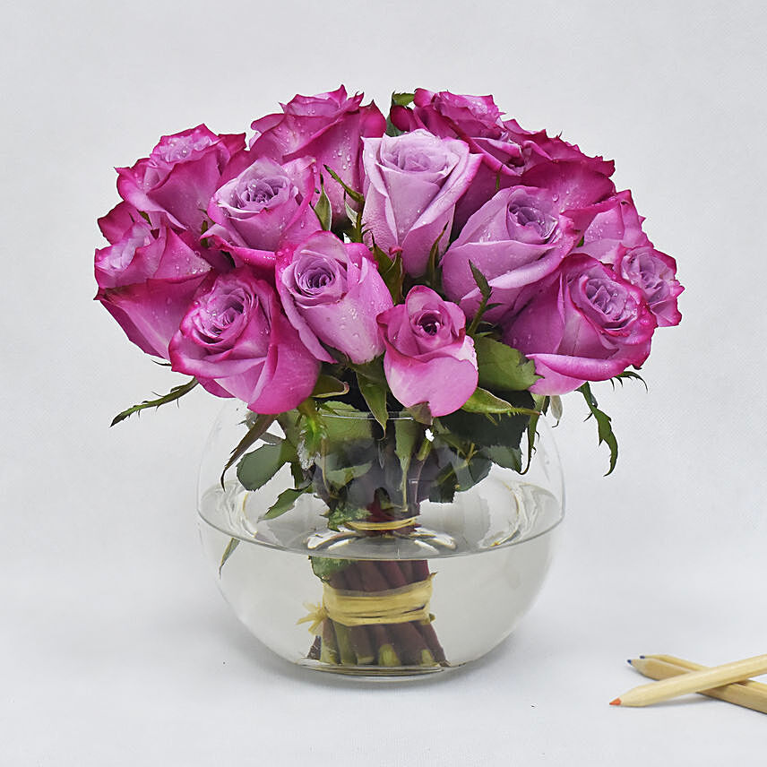 Purple Roses in Glass Bowl