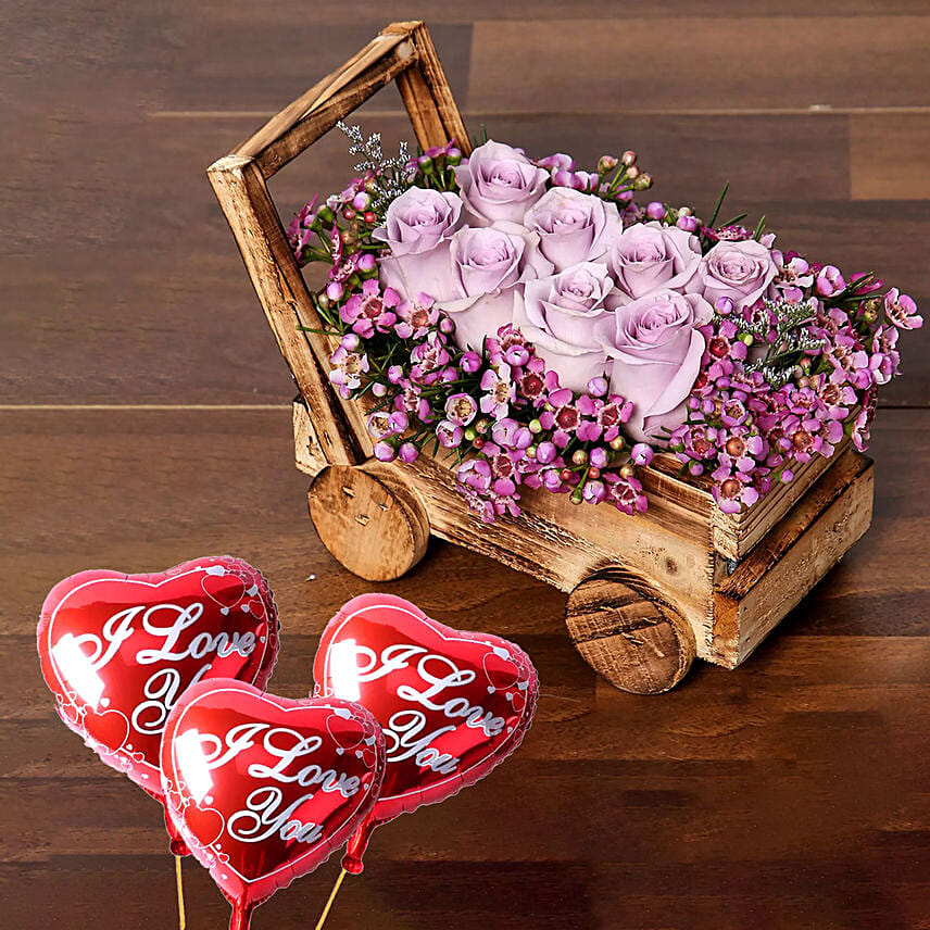 Elegant Arrangement of Purple Roses With I Love You Balloons